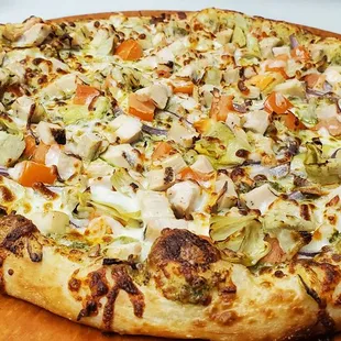 Pesto Heart Delight-Pesto sauce, Red onion, tomatoes, artichoke heart and fresh garlic