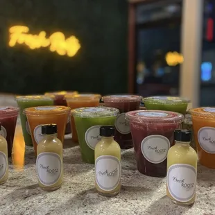 a variety of cold - pressed juices