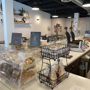a counter with a variety of baked goods