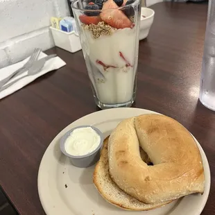 Yogurt parfait and a bagel