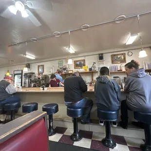 people sitting at the counter
