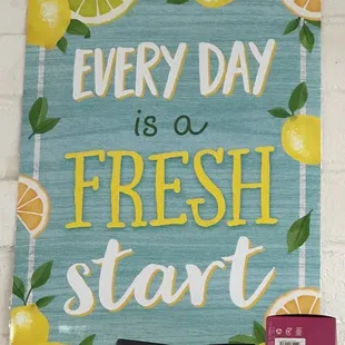 a sign with lemons on it