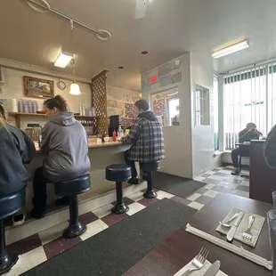 people sitting at the counter