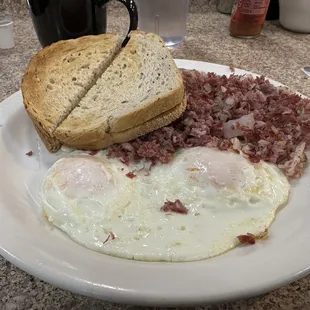 &quot;Real&quot; Corned beef and hash.  Eggs over easy  Rye Toast