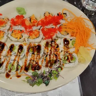 a plate of fresh sushi