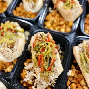 Chicken Philly Steak - shaved chicken breast, sautéed onions and peppers and provolone cheese on a French roll. Served with herb potatoes.