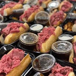Shaved French Dip - shaved roast beef, Swiss cheese, horseradish Aioli, beef jus, sub rolled and served with roasted rosemary potatoes.