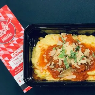 Beef Meatballs &amp; Polenta - three meatballs, marinara sauce, parmesan cheese, and fresh basil. Served with sweet corn polenta.