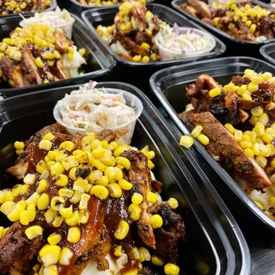 BBQ Chicken Bowl - braised chicken served with cheesy mashed potatoes, grilled sweet corn, and coleslaw.