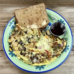 Farmer's Omelette: 3 eggs, bacon and sausage, veggies with toast and jam