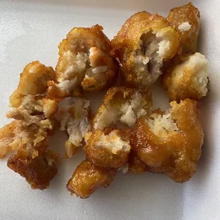 a close up of a plate of fried food
