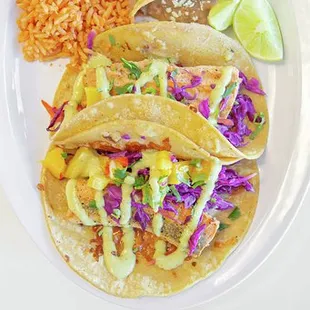 Salmon Tacos ! With a homemade mango salsa and chili lime dressing