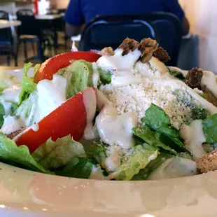 Corporate Chef Caesar Salad...you can add a chicken breast for only $2.50, and it is very, very moist and tasty. imo.