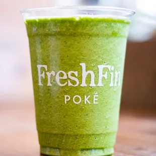  green smoothie in a plastic cup