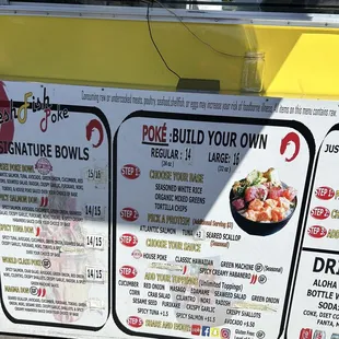 menus on the side of a food truck