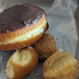 Filled chocolate donut and donut holes