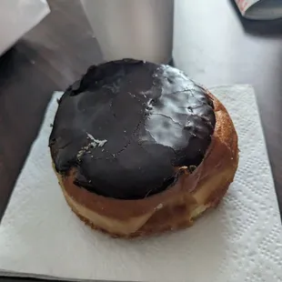 Boston creme donut after bringing it home, moments before being consumed.