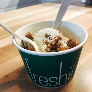 a bowl of ice cream and a spoon