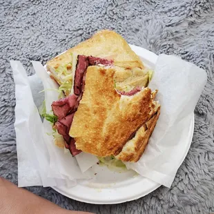 This photo is from my 2nd visit (the very next day). This is their pastrami sandwich...  and it was soooo good!