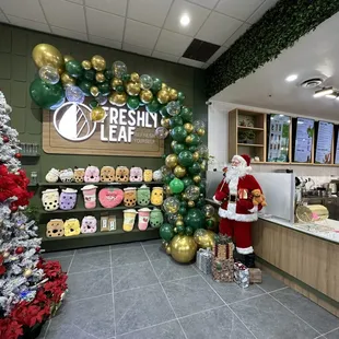 a christmas tree and santa claus