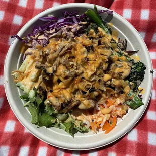 The Freshroll Bowl with Lemongrass pork, mixed greens, and NamNam Sauce