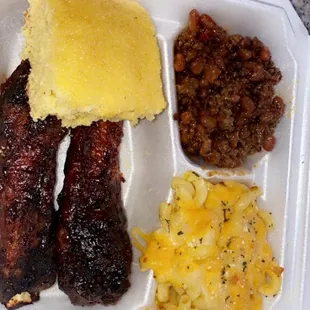 Fried ribs with honey glazed cornbread,  baked macaroni and baked beans