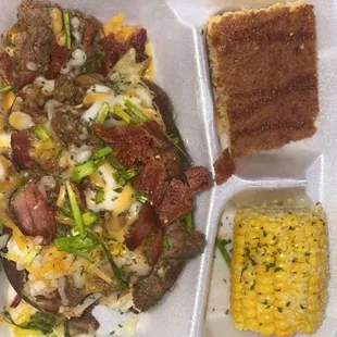 Brisket baked potatoe with honey glazed cornbread and corn on the cob!