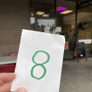 the number 8 on a paper bag