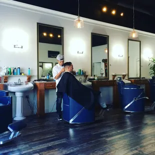 2 barbers, 4 stations and fresh looking atmosphere.