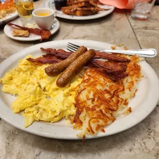 Eggs, hashbrowns, bacon , sausage