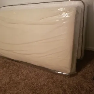 A twin matress and a "combo" (mattress &amp; pallet all in one) BOX.