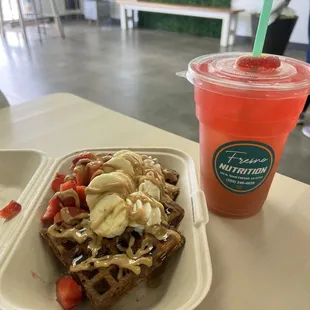 Peanut butter, strawberry waffles with a strawberry cucumber tea.