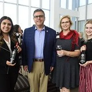 a group of people posing for a picture