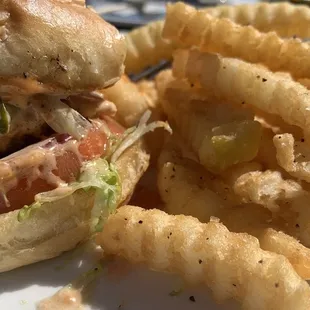 Burger and fries, I started eating it so it's messy! But it was delicious!!!