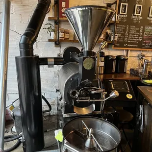 a coffee grinder in a coffee shop