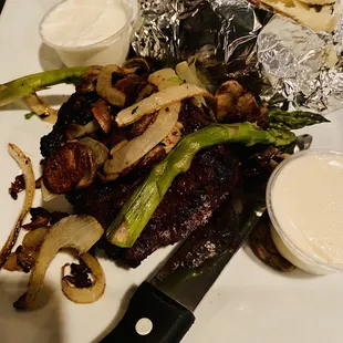 Filet with mushrooms, onions and baked potato