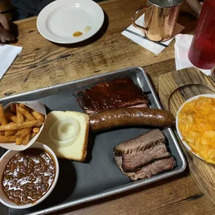 3 meat plate with beans and fries and a side of mac!