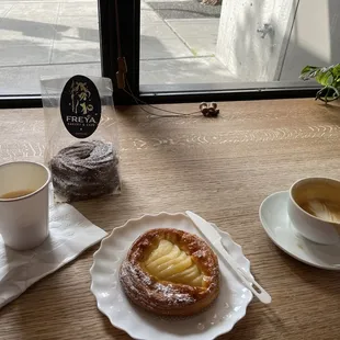 Pear tart, almond and cardamom coffee and chocolate biscuits in the bag. Everything was delicious!