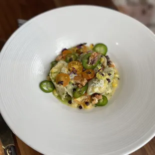 a plate of food on a wooden table