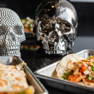 a skull and a plate of food