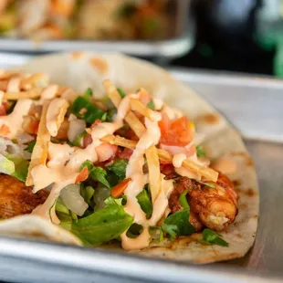 a close up of a taco