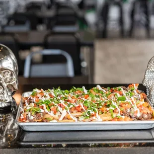 a tray of food and a skull