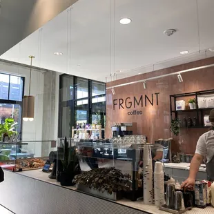 a man working behind a counter