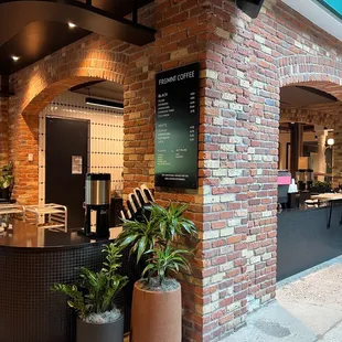 the entrance to the coffee shop