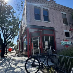 a bicycle parked in front of a building