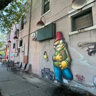 a cartoon character on a wall