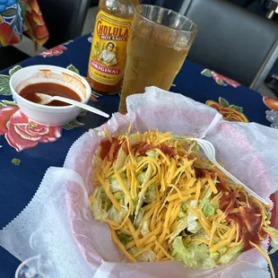 Delicious gringo style tacos. Tons of seasoned ground beef, sharp cheddar cheese and lettuce, topped with a semi spicy salsa.