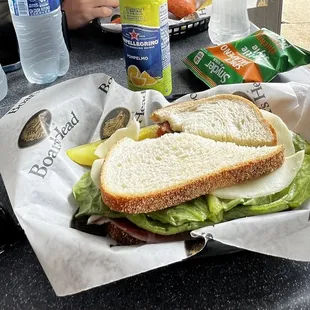 a sandwich and water bottles