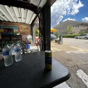 a can of water on a table