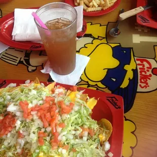 Fricken Chicken Nachos and sweet iced tea!